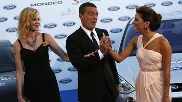 Antonio Banderas se diverte com sua esposa Melanie Griffith e a atriz Eva Longoria em evento - Reuters