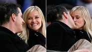 Reese Witherspoon vive clima de romance com o marido, Jim Toth, em jogo da NBA - Reuters