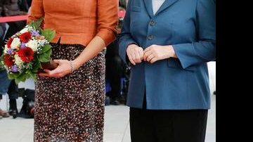 As poderosas Máxima Zorreguieta e Angela Merkel - Tobias Schwartz/Reuters