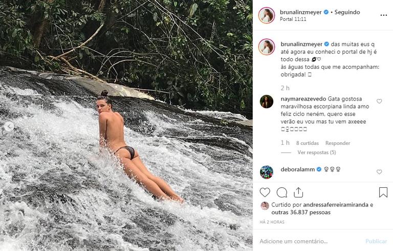 Bruna Linzmeyer posa fazendo topless em meio à natureza