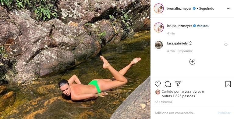 Bruna Linzmeyer posa topless em cachoeira e web se derrete