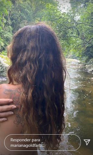 Mariana Goldfarb curte dia de cachoeira com Cauã Reymond