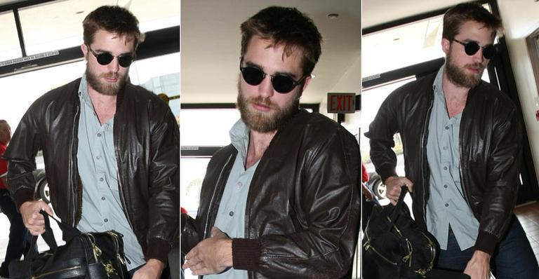 <strong>Robert Pattinson</strong> aparece barbudo em aeroporto de Los Angeles