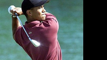 Tiger Woods estréia como pai... - Foto: AFP