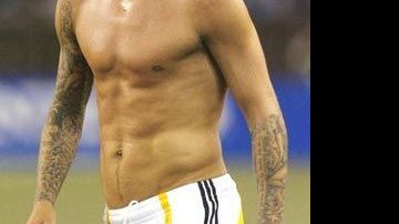 David Beckham exibe suas tatuagens - Reuters