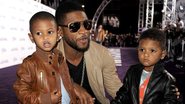 Usher com os filhos Usher V e Naviyd Ely - Getty Images