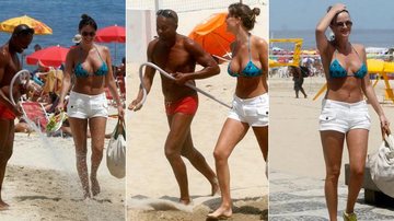 Cavalheiro molha areia quente para que Letícia Birkheuer caminhe - Edson Teófilo/PhotoRio News