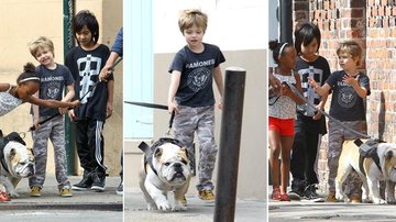Maddox, Zahara e Shiloh, filhos do casal Brad Pitt e Angelina Jolie, se divertem ao passear com o cão da família - Grosby Group