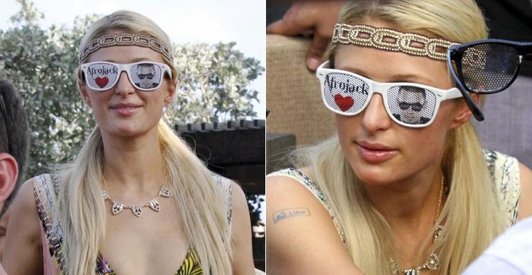 Paris Hilton usa óculos em homenagem a Afrojack em festa na Flórida - The Grosby Group