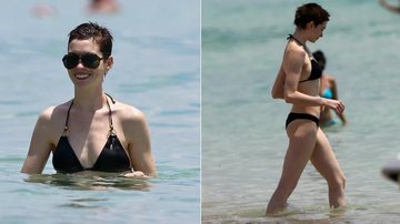 Anne Hathaway em praia de Miami - Splash News splashnews.com