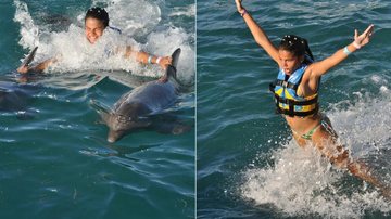 Laura Barreto ‘pega carona’ com golfinho Cancun, no México - Divulgação