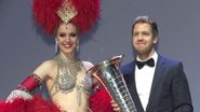 Sebastian Vettel recebe seu troféu de campeão da f1 - Michel Euler/Reuters