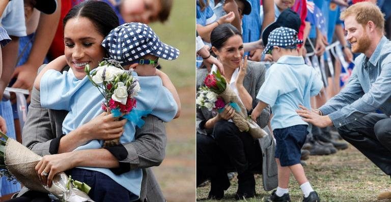 Grávida, Meghan Markle se encanta com criança durante tour real - Getty Images