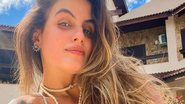 Só de biquíni, Carol Peixinho pega Sol deitada na varanda - Reprodução/Instagram