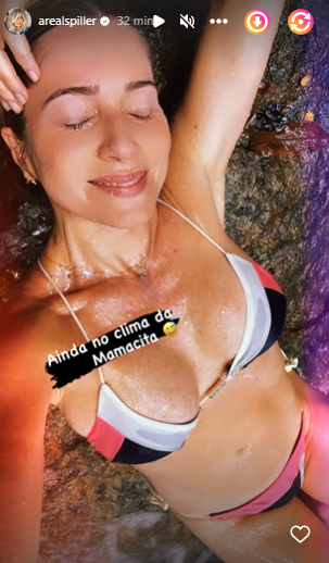 Leticia Spiller exibe corpão em banho de cachoeira