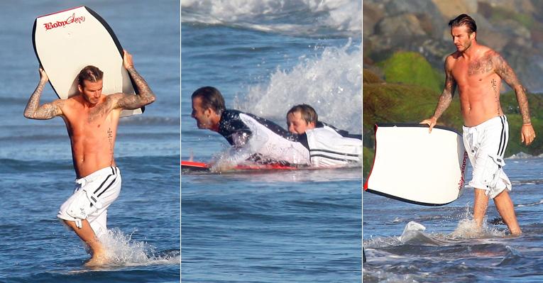 David Beckham ensina a arte do surfe ao filho Brooklyn