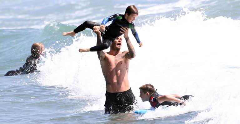 David Beckham com os filhos