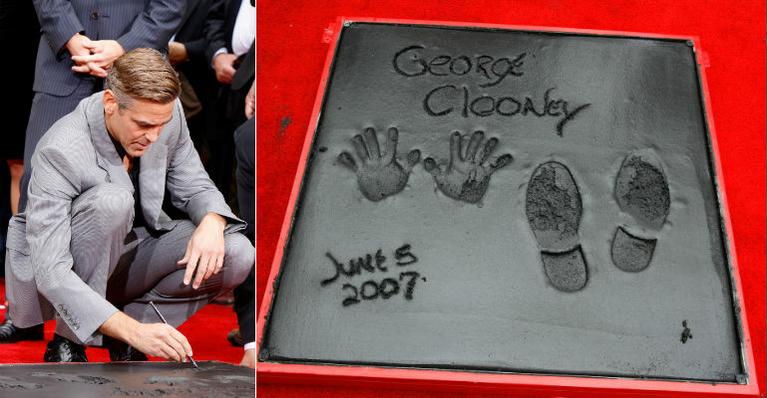 George Clooney grava seu nome em frente ao Kodak Theather, em Los Angeles, em 2007