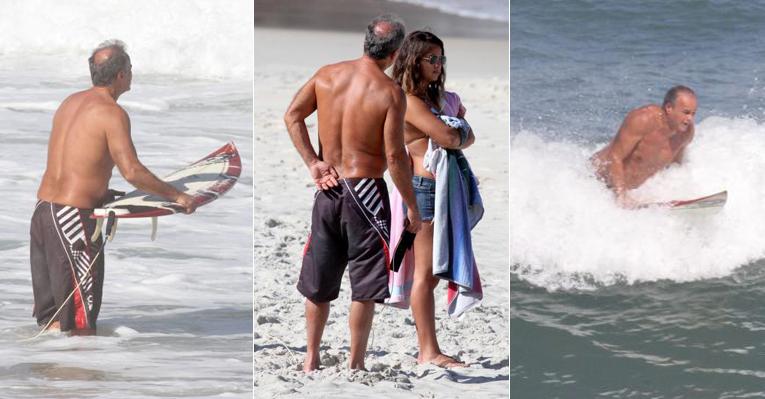 Kadu Moliterno surfa e leva filha Lanai na praia
