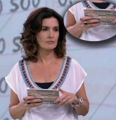 O esmalte cinza, usado pela apresentadora Fátima Bernardes, no 'Encontro', é da marca Lancôme, cor 407N